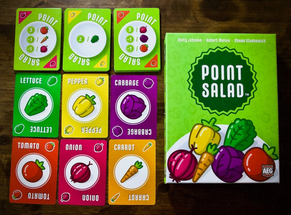The vegetable market in Point Salad by AEG, Flatout Games featuring cabbage, pepper, lettuce, tomato, onion and carrot