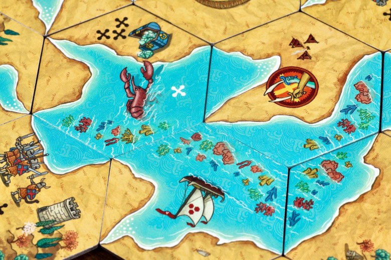 Land vs. Sea by Good Games Publishing, placed tiles featuring a ship, lobster, treasure and knights