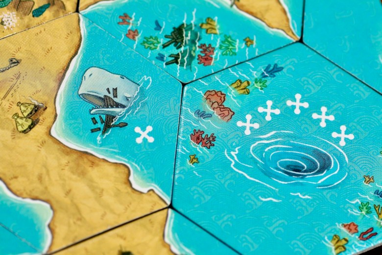 Land vs. Sea by Good Games Publishing - whirlpool and whale