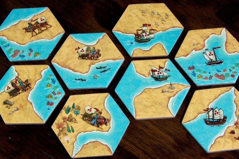 Land vs. Sea by Good Games Publishing Tiles Placement Board Game Ships and Caravans featuring many cultures