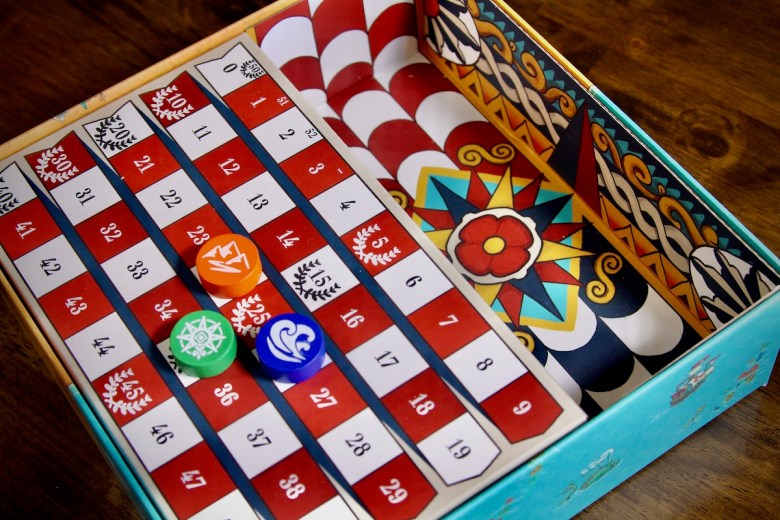 Multifunctional box insert in Land vs. Sea by Good Games Publishing - doubles as the score board and has lovely artwork