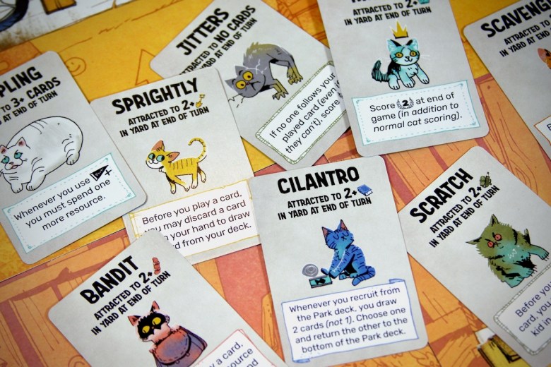 Meow! The finicky felines of Fort won't stay in your yard if somebody else tempts them away. Fort: Cats & Dogs Expansion by Leder Games