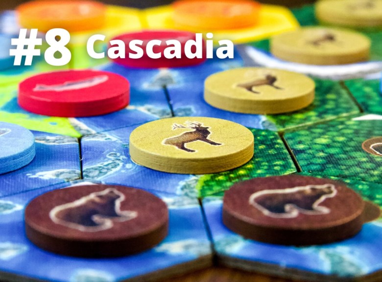 Cascadia boardgame featuring tiles and animal tokens with elk, salmon and grizzly bears