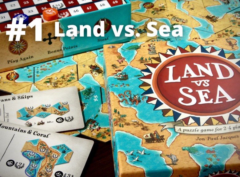 Land vs Sea boardgame box with tiles and storage pictured