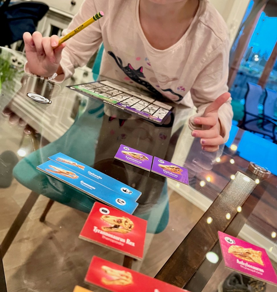 Child playing Dinosaur Exhibit