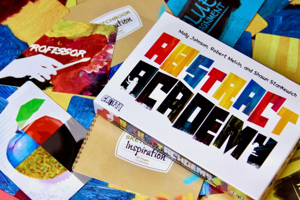 Abstract Academy card game box and components