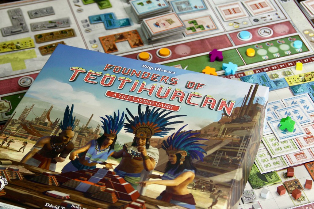 Cover art and components for Founders of Teotihuacan the board game