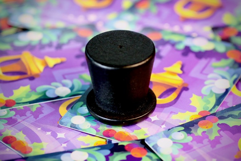 Top Hat First player token in Ghosts of Christmas