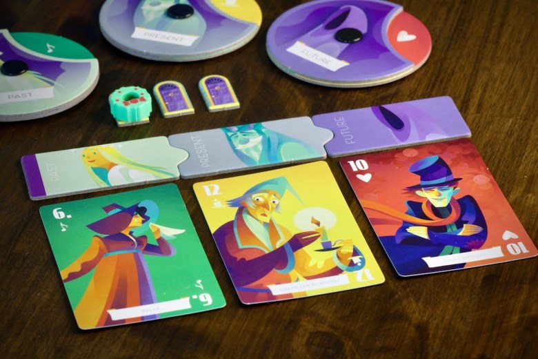 Ghosts of Christmas with 3 cards played to each era